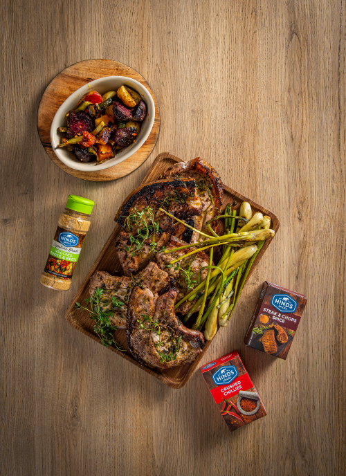 Fennel and Mustard Pork Chops Served with Chakalaka and Roasted Veggies