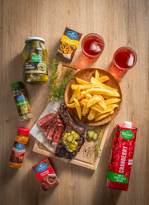 Flame-grilled Mustard Sirloin Steaks, Topped with Herb Butter and Gherkins